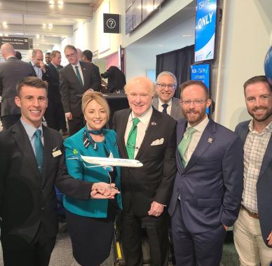 Council members & Aer Lingus staff posing with model airplane